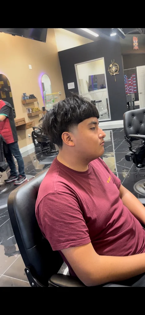 Side profile of textured haircut before styling