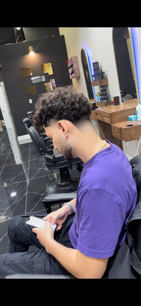 Curly cut with tapered side profile