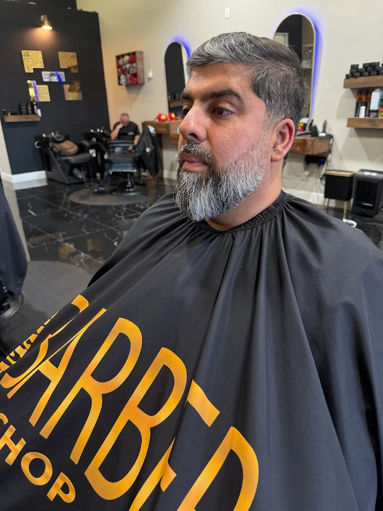 Polished haircut and beard shape-up